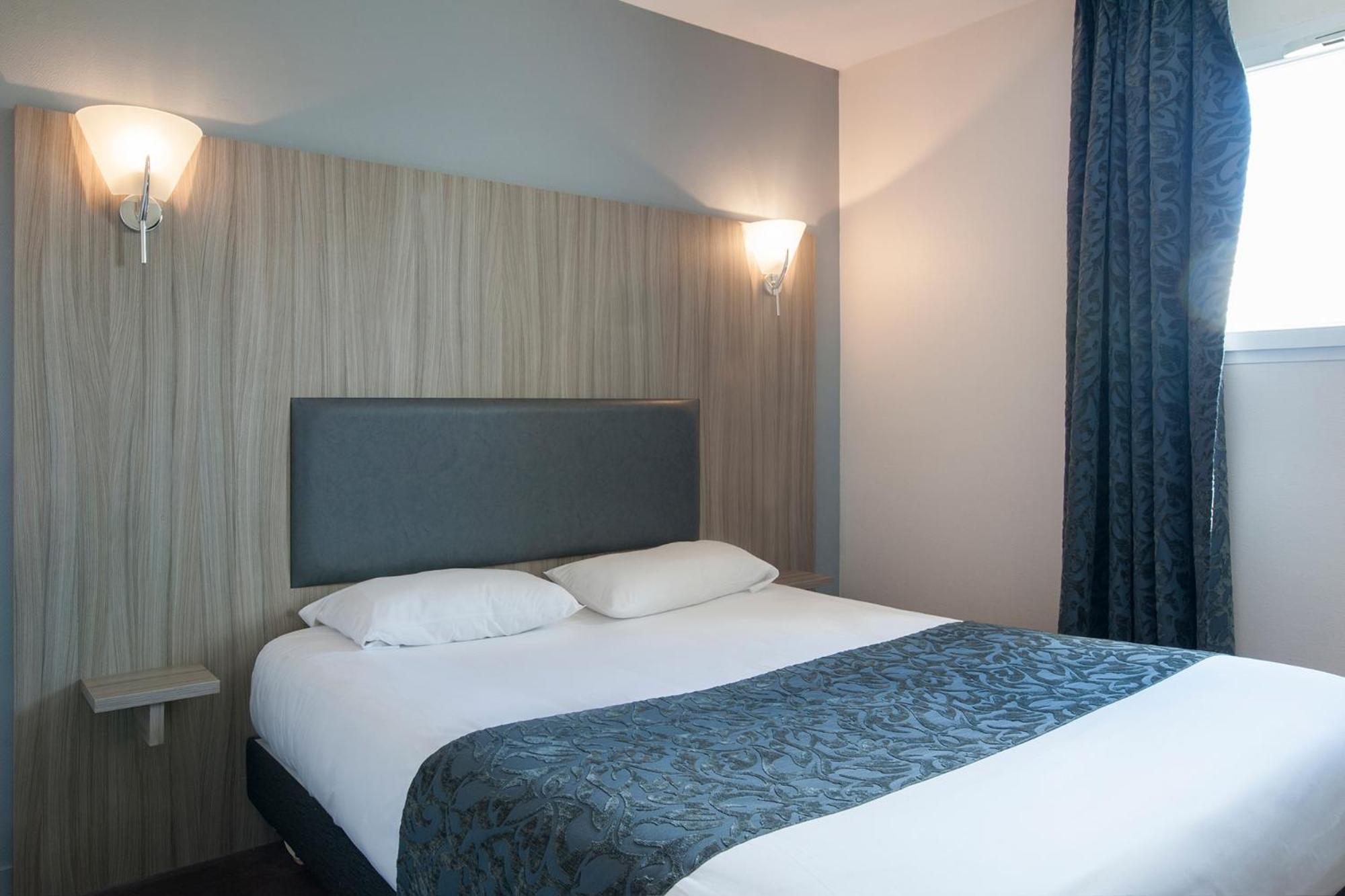 Brit Hotel Confort Alexia - เลอ ซูเตอร์เรน ภายนอก รูปภาพ