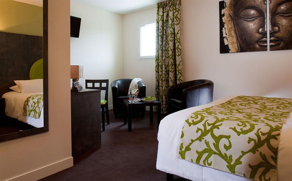 Brit Hotel Confort Alexia - เลอ ซูเตอร์เรน ภายนอก รูปภาพ